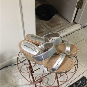 Silver wedge heel new never been worsen